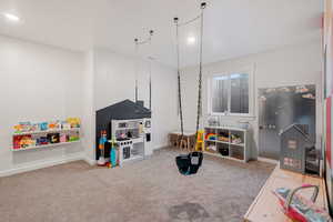 Bedroom/playroom with carpet