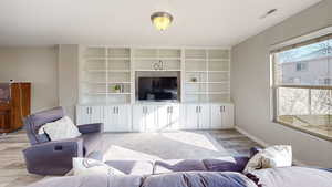 Living room featuring light hardwood / wood-style floors