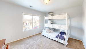 View of carpeted bedroom