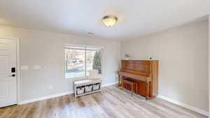 Misc room featuring light wood-type flooring