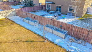 Exterior space featuring grilling area and a lawn