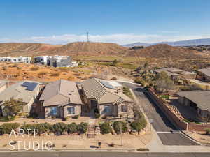 Drone / aerial view with a mountain view and golf course view