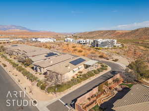 Birds eye view of property featuring a mountain view and golf course view