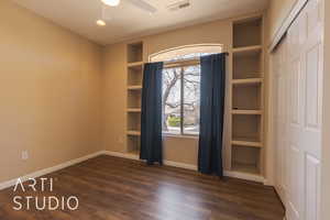 bedroom 3 featuring ceiling fan, built in features, and lvp style flooring