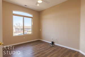 bedroom 2 featuring lvp style flooring and a ceiling fan