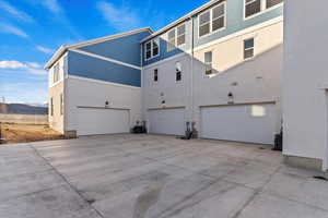 Exterior space featuring a garage and a mountain view