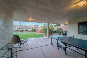 View of patio / terrace with a mountain view