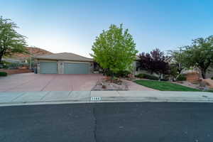 View of front of property with a garage