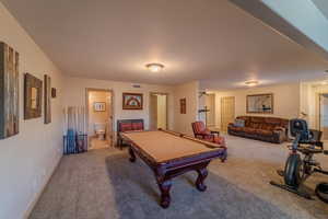 Rec room with billiards and carpet floors