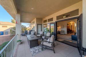 View of patio featuring a balcony