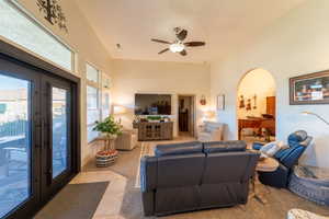 Living room featuring ceiling fan