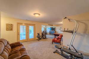 Workout room featuring carpet