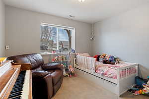 View of carpeted bedroom