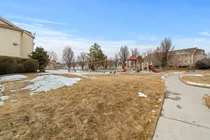 View of yard featuring a playground