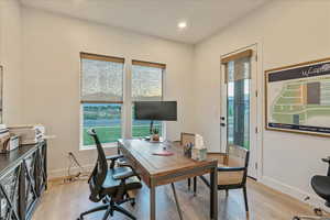 Office space featuring light wood-type flooring