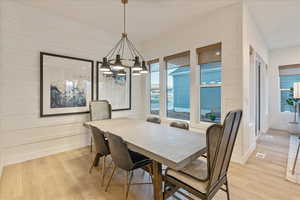 Dining room featuring light wood-type flooring