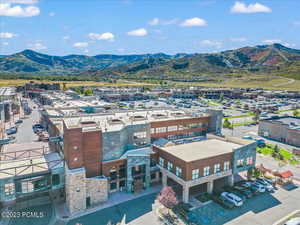 Birds eye view of property with a mountain view