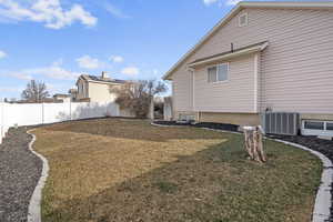 View of yard featuring central air condition unit