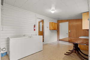 Laundry room with water heater and washer and dryer.