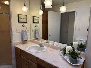 Primary Bathroom featuring vanity, shower, bathtub, & sink