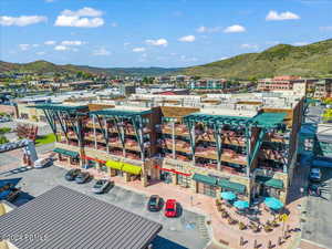 Birds eye view of property featuring a mountain view