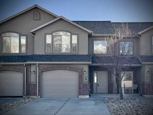 View of front of house with a garage