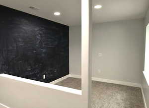 Interior space featuring carpet