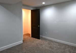 Unfurnished room with carpet floors