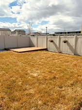View of yard featuring a fenced backyard