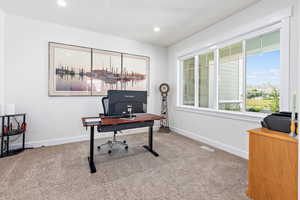 View of carpeted home office