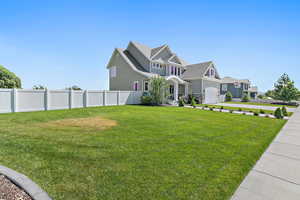 View of front of house with a front lawn