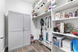 Mudroom with hardwood / wood-style floors