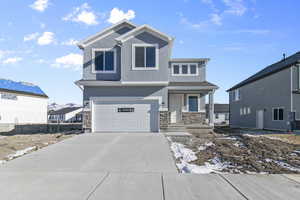 Front of property with a garage