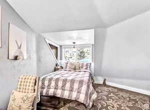 Bedroom featuring hardwood / wood-style flooring