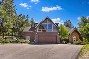 View of front of home featuring a garage