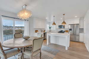 Kitchen/dining area with sliding door to deck