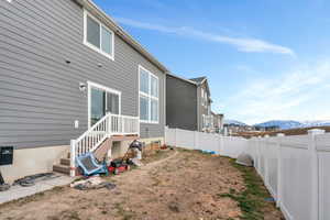 Back of house with a mountain view