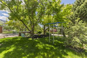 View of yard featuring a playground