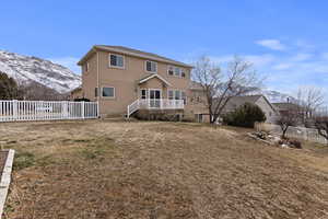 Rear view of house with a mountain view