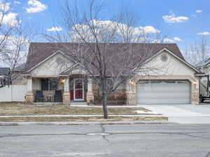 View of front of home with attached 2-car garage