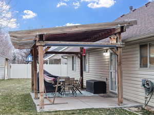 Back patio with pergola and shade cloth