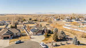 Birds eye view of property featuring a mountain view