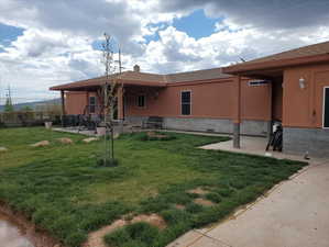 View of yard with a patio area