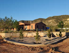 View of front of house featuring a mountain view