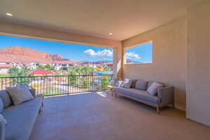 View of patio / terrace featuring a balcony, a mountain view, and outdoor lounge area