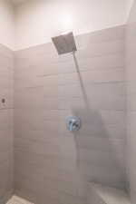 Bathroom with a tile shower