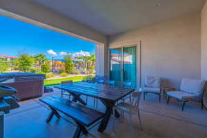 View of patio featuring a hot tub