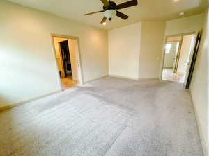 Unfurnished room with light carpet and ceiling fan