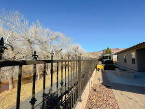 View of yard featuring a mountain view and a patio