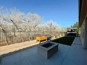 View of patio / terrace featuring an outdoor fire pit